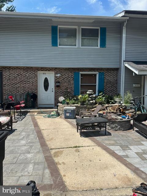 view of front of home with a patio