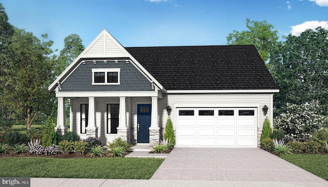 view of front of house featuring a porch and a garage