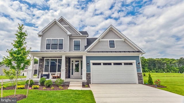 craftsman-style home featuring a front yard