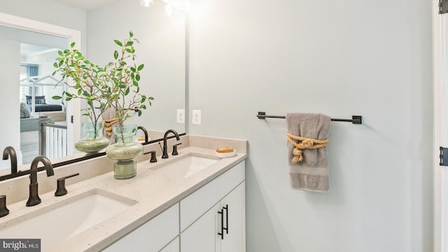 bathroom with dual vanity