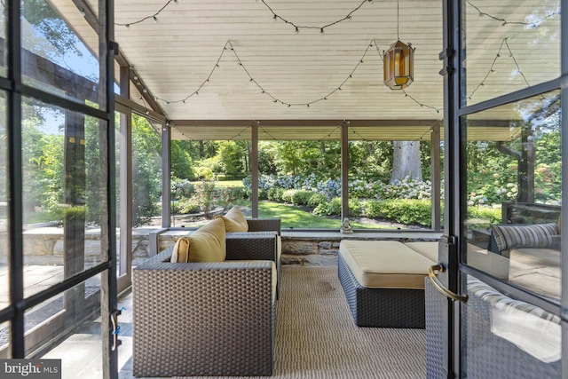 unfurnished sunroom with a wealth of natural light