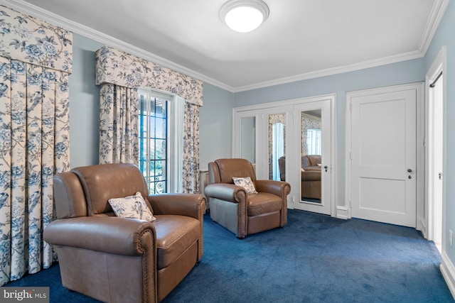 sitting room featuring dark carpet, crown molding, and french doors