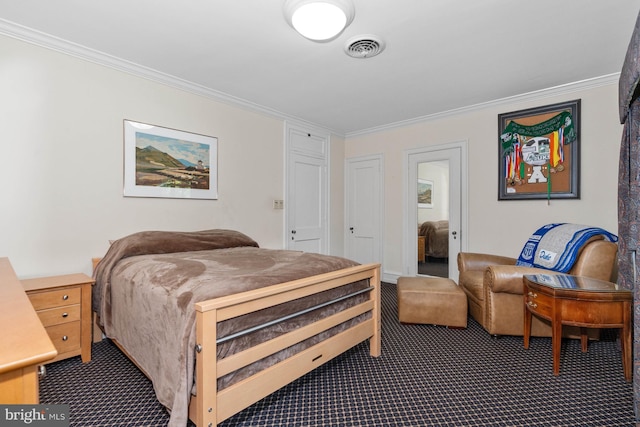 carpeted bedroom with crown molding