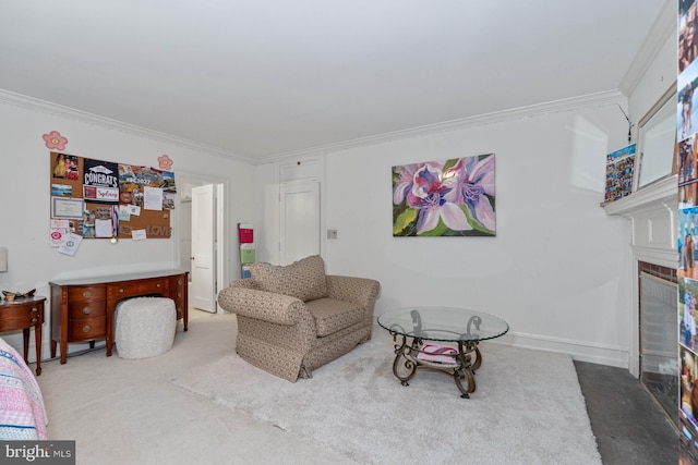 carpeted living room with ornamental molding