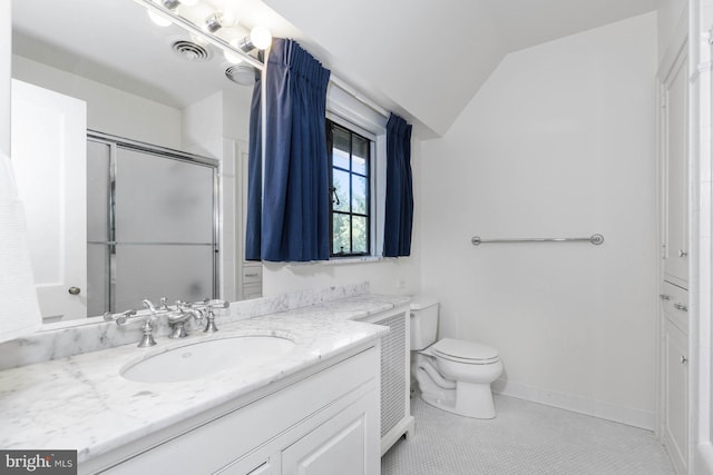 bathroom with lofted ceiling, vanity, walk in shower, toilet, and tile patterned floors