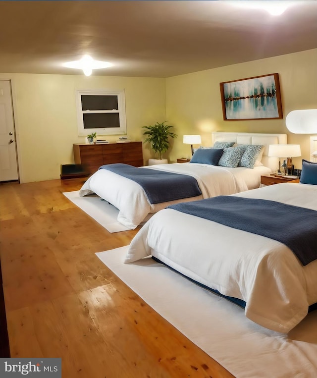 bedroom featuring light wood-type flooring