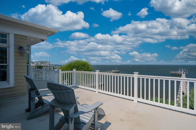 view of patio / terrace featuring a water view