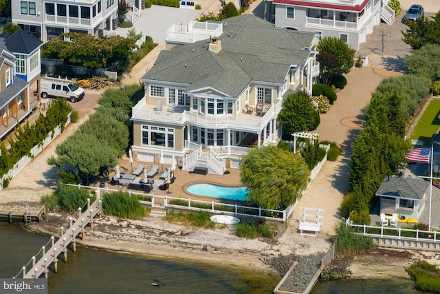 bird's eye view with a water view