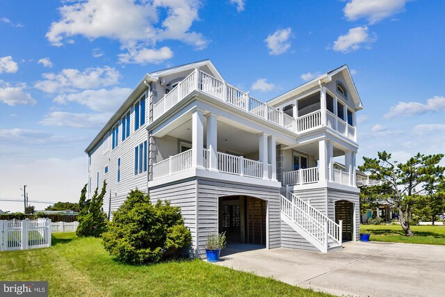 beach home featuring a balcony