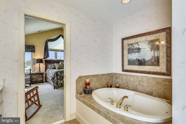 bedroom with ceiling fan, light carpet, and high vaulted ceiling