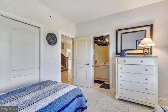 bedroom featuring light carpet and ceiling fan