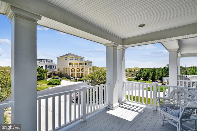 wooden deck featuring a porch