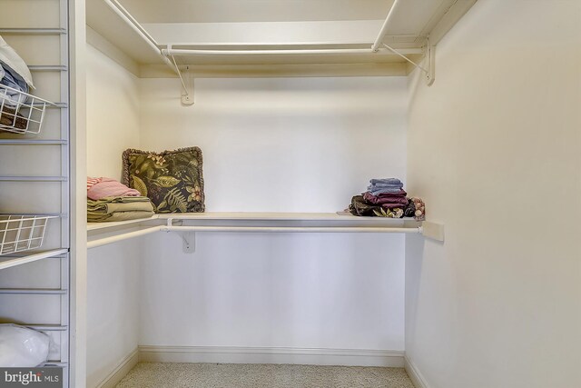 laundry room featuring light tile patterned flooring, sink, and washer and dryer