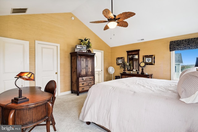 bedroom featuring vaulted ceiling, visible vents, and light colored carpet