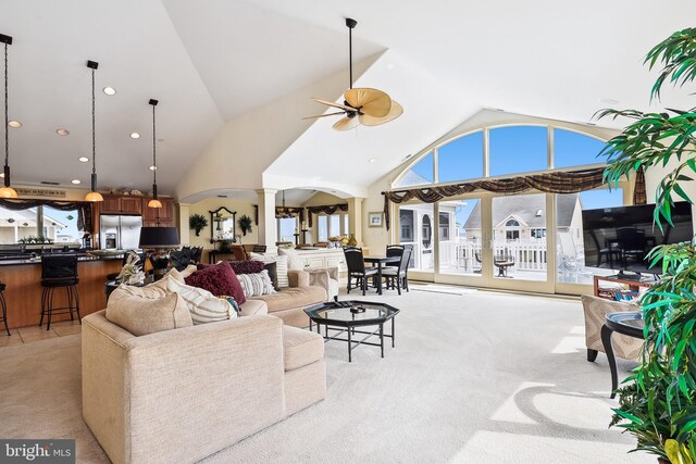 interior space with ceiling fan and high vaulted ceiling