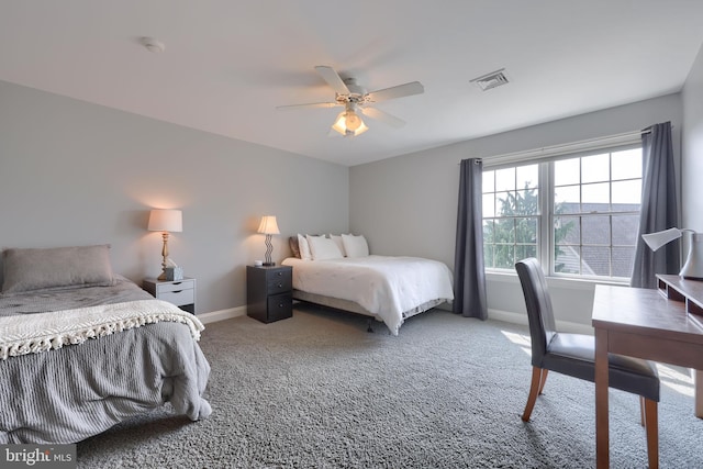 carpeted bedroom featuring visible vents, ceiling fan, and baseboards