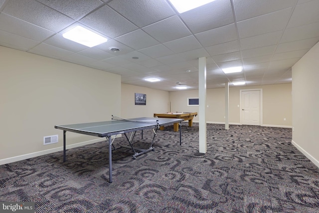 game room featuring carpet floors, a paneled ceiling, visible vents, and baseboards