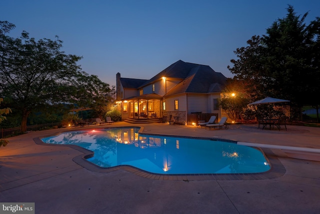 view of pool featuring a fenced in pool and a patio