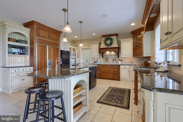 kitchen featuring open shelves, black appliances, a sink, and tasteful backsplash