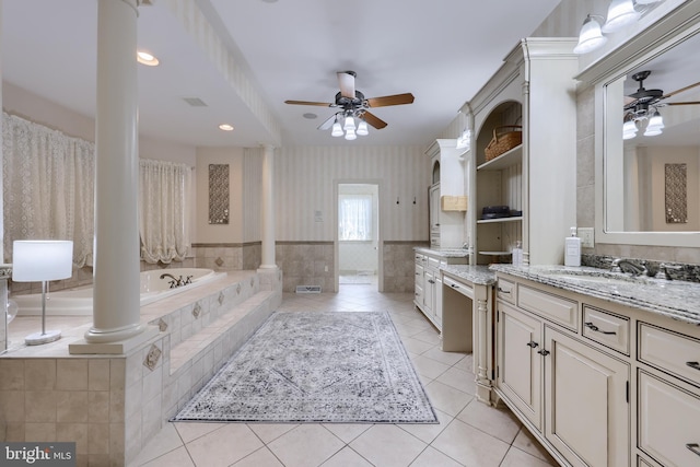 bathroom featuring a ceiling fan, tile patterned flooring, ornate columns, and wallpapered walls