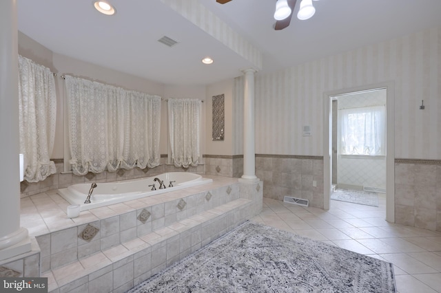 full bathroom with wainscoting, visible vents, ornate columns, and wallpapered walls