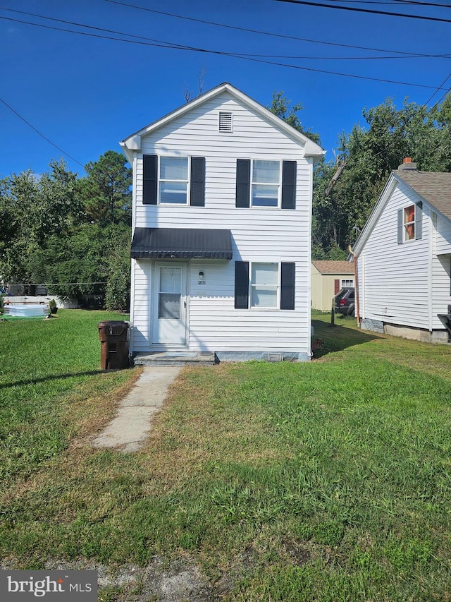 view of front of house with a front yard