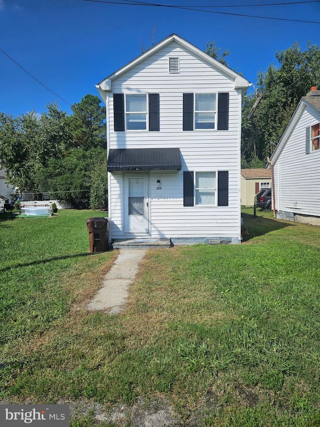 view of front of property with a front yard