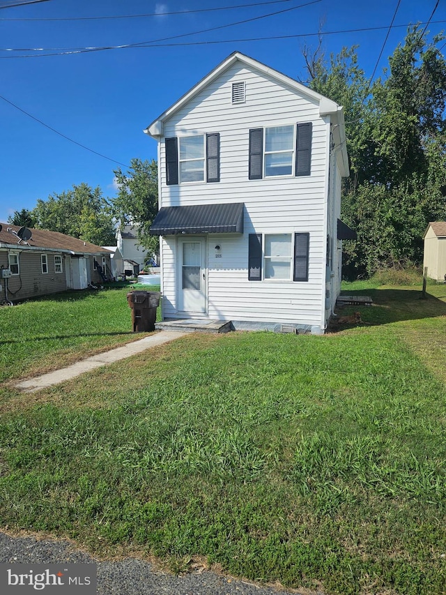 view of front property with a front yard