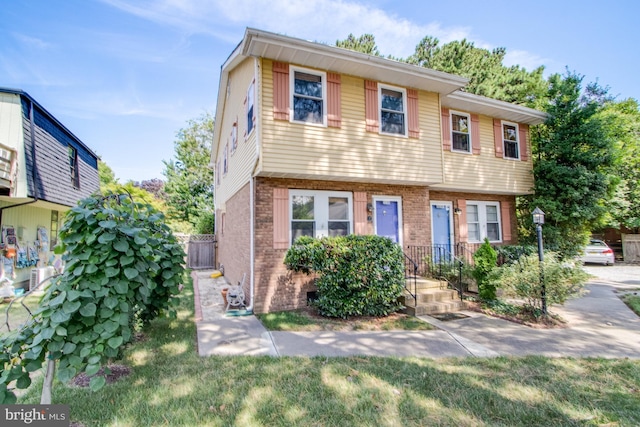 view of front of house with a front lawn