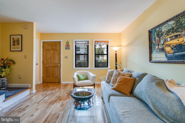 living room with light hardwood / wood-style flooring