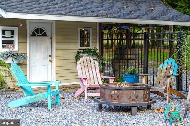 view of patio / terrace with an outdoor fire pit