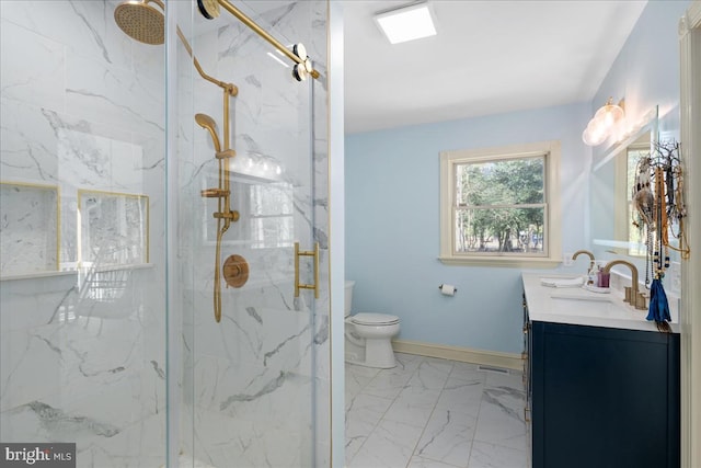 bathroom with vanity, toilet, and an enclosed shower