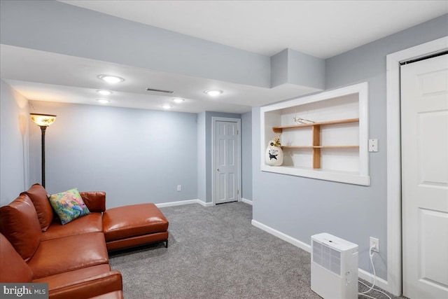 sitting room featuring carpet floors