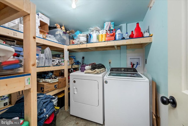 washroom with washing machine and dryer