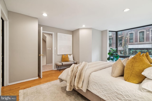 bedroom featuring hardwood / wood-style flooring