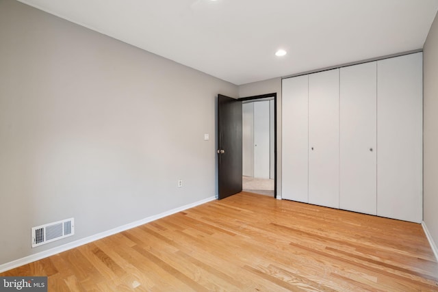 unfurnished bedroom with light hardwood / wood-style floors