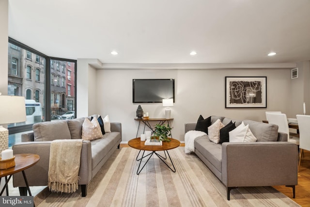 living room featuring light wood-type flooring