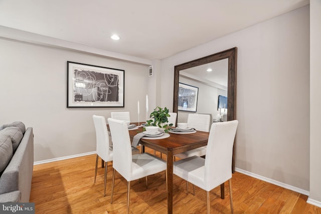 dining area featuring light hardwood / wood-style floors