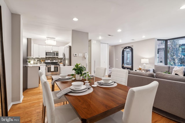 dining area featuring light hardwood / wood-style flooring