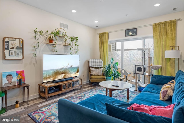 living room with hardwood / wood-style floors