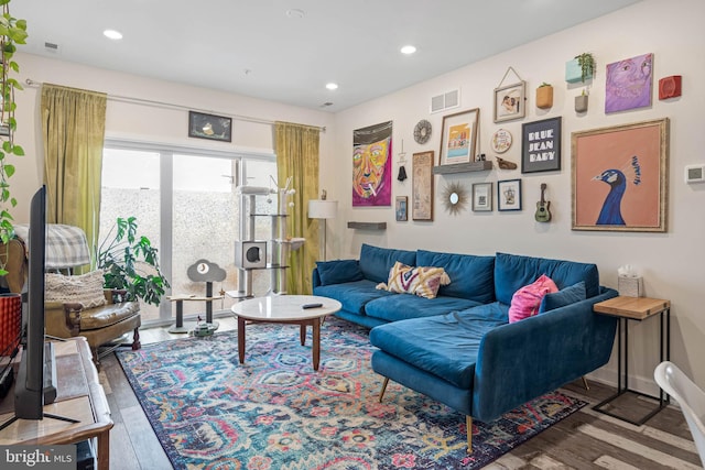 living room featuring dark hardwood / wood-style floors