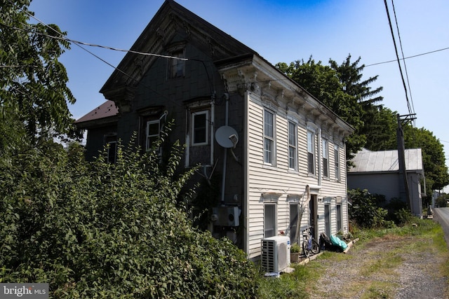 view of property exterior featuring ac unit