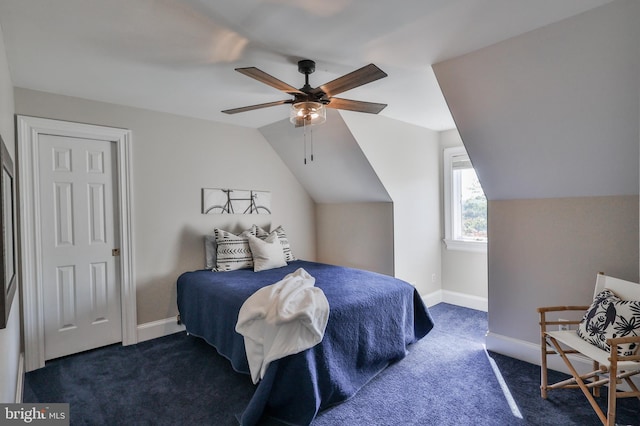 carpeted bedroom featuring ceiling fan and lofted ceiling