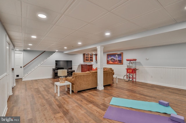 exercise room featuring hardwood / wood-style flooring