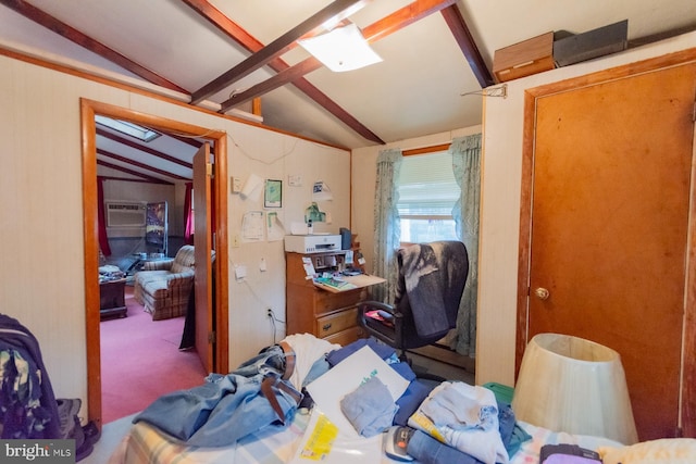 bedroom featuring lofted ceiling with beams and carpet