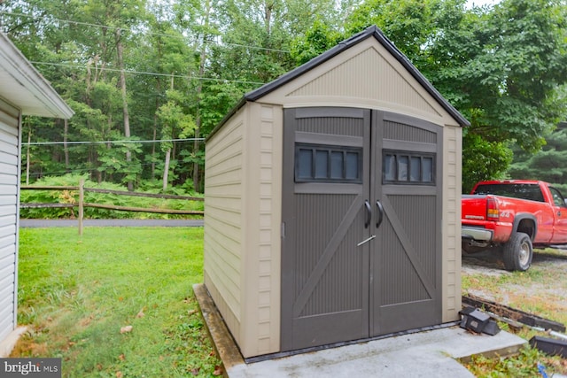 view of outdoor structure with a yard