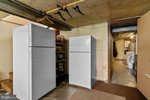 kitchen featuring white refrigerator and fridge