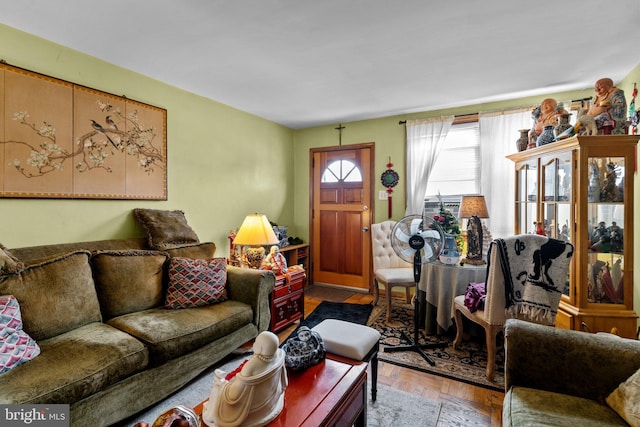 living room with parquet flooring