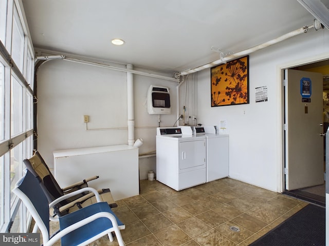 washroom featuring washer and dryer and heating unit