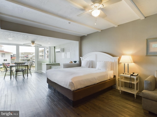 bedroom with dark wood-type flooring, ceiling fan, a wall mounted air conditioner, and beam ceiling